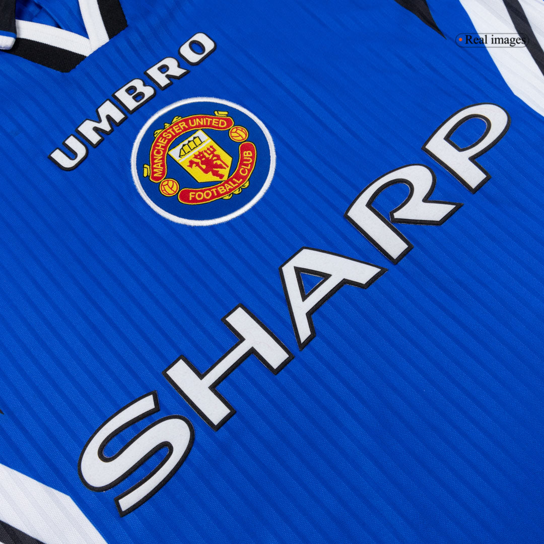 Maillot rétro domicile Manchester United 1996/97 bleu