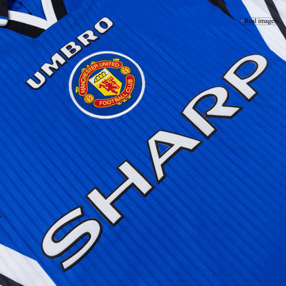 Maillot rétro domicile Manchester United 1996/97 bleu
